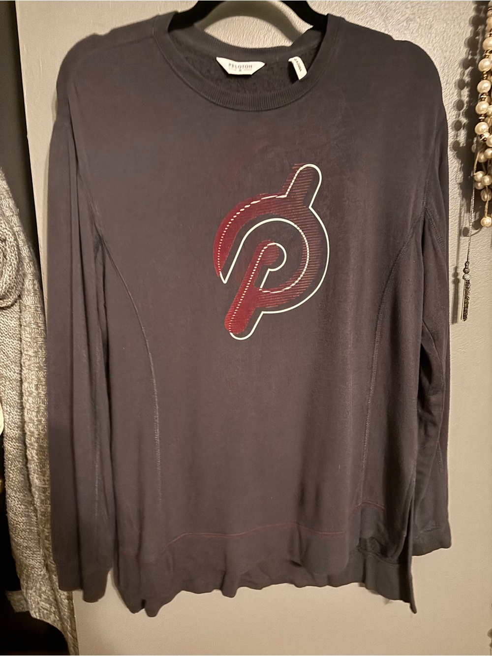 Peloton Long-Sleeve Men’s Logo Tee in Black with Red Accent